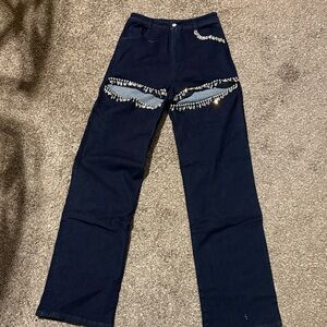 Stylish Women's Navy Flare Jeans with Distressed Details